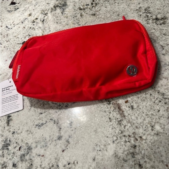 lululemon athletica Handbags - Lululemon Everywhere Red Belt Bag 1L Sold Out Style!!